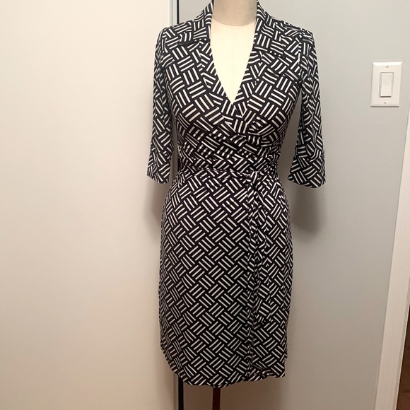 femme Dresses & Skirts - Femme brand wrap dress navy and white geo print with 3/4 sleeve. Size S